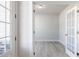 Bright office space featuring wood-look floors and a French door entryway at 68 Tee Time Ter, Benson, NC 27504