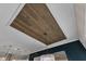Unique ceiling design with wood paneling and elegant pendant lighting fixture at 8121 Greys Landing Way, Raleigh, NC 27615