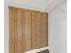 Inside the closet featuring wood backing with white wired shelves for storage at 8121 Greys Landing Way, Raleigh, NC 27615