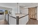Foyer with chandelier lighting and hardwood flooring, showcasing staircase and interior design at 8121 Greys Landing Way, Raleigh, NC 27615