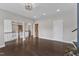 Upstairs loft area with hardwood floors, wooden railing and sliding barn doors at 8121 Greys Landing Way, Raleigh, NC 27615