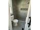 Newly renovated bathroom featuring a tiled shower with a niche and decorative floor at 825 Long Ave, Rocky Mount, NC 27801