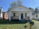 Charming single-story home with welcoming front porch and well-maintained lawn at 825 Long Ave, Rocky Mount, NC 27801