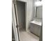Bathroom featuring a modern vanity and storage, tiled floors and potential for customization at 905 Ardmore Dr, Durham, NC 27713