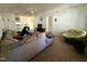 Well-lit living room offering a sectional sofa, an adjoining kitchen, and a comfortable sitting area at 1140 Carlton Ave # 201, Raleigh, NC 27606
