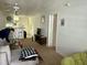 Spacious living room with neutral carpet provides a comfortable and inviting atmosphere at 1140 Carlton Ave # 201, Raleigh, NC 27606