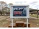Capital City BMX park sign with illustration of BMX rider set against a backdrop of the Raleigh skyline at 1203 Brookside Dr, Raleigh, NC 27604
