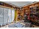 Bedroom featuring custom built-in bookshelves surrounding the bed, creating a cozy and organized space at 130 E Longview St # Apt K, Chapel Hill, NC 27516