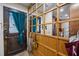 Cozy entryway featuring a mirrored coat rack and tiled floor at 130 E Longview St # Apt K, Chapel Hill, NC 27516
