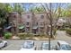Unique wooden exteriors and lush front landscaping in a neighborhood setting at 130 E Longview St # Apt K, Chapel Hill, NC 27516