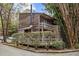 Unique property featuring a deck, a chimney, and natural landscaping at 130 E Longview St # Apt K, Chapel Hill, NC 27516