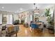 Well-lit living room with fireplace, hardwood floors, and casual seating at 130 E Longview St # Apt K, Chapel Hill, NC 27516