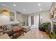 Inviting living room with stairs, fireplace, and outdoor access at 130 E Longview St # Apt K, Chapel Hill, NC 27516