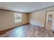 Bedroom with wood-look flooring and a window at 1326 Stephens Dr, Roxboro, NC 27573