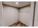 A closet with vinyl floors and a wire rack for optimal storage and organization at 1326 Stephens Dr, Roxboro, NC 27573