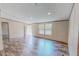 Bright living room featuring laminate flooring, recessed lighting, and an airy feel at 1326 Stephens Dr, Roxboro, NC 27573