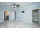 Spacious main bedroom featuring laminate floors and access to an ensuite bathroom and walk-in closet at 135 Brocks Trce, Burlington, NC 27215