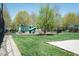 Community playground offers a fun outdoor space with modern play equipment and shaded seating at 135 Brocks Trce, Burlington, NC 27215