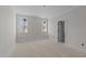Bright bedroom with natural light from two windows, creating a warm and inviting space at 1425 Lake Adventure Ct, Raleigh, NC 27613