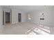 Unfinished bedroom with natural light streaming through two windows and neutral walls at 1425 Lake Adventure Ct, Raleigh, NC 27613