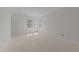 Bright bedroom with multiple windows providing natural light, creating an inviting atmosphere at 1425 Lake Adventure Ct, Raleigh, NC 27613