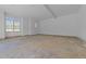 Unfinished bonus room with natural light from large windows, offering versatile space for customization at 1425 Lake Adventure Ct, Raleigh, NC 27613