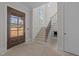 Entryway with staircase, stained glass window and front door at 1425 Lake Adventure Ct, Raleigh, NC 27613