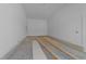 Unfinished garage space showcasing a clean slate ready to be transformed into a functional area at 1425 Lake Adventure Ct, Raleigh, NC 27613