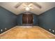 Bedroom featuring blue walls, ceiling fan, neutral carpet and a window with shade at 1508 Middle Ridge Dr, Willow Springs, NC 27592