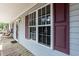 Welcoming front porch featuring a swing, perfect for relaxation at 1508 Middle Ridge Dr, Willow Springs, NC 27592