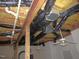 Unfinished basement with ceiling ducts and two ceiling fans at 1623 Rogers Pointe Ln, Creedmoor, NC 27522