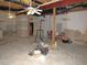 Unfinished basement with exposed ceiling and concrete floor offers potential for a variety of uses at 1623 Rogers Pointe Ln, Creedmoor, NC 27522