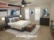 Stylishly staged bedroom featuring a modern color block accent wall and contemporary furnishings at 1623 Rogers Pointe Ln, Creedmoor, NC 27522
