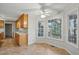Bright breakfast nook with tile floors, large windows and ample natural light at 167 Coachmans Cove Rd, Four Oaks, NC 27524