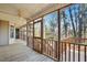 Spacious screened-in porch perfect for enjoying the outdoors while being protected from insects at 167 Coachmans Cove Rd, Four Oaks, NC 27524