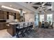 Modern kitchen features stainless steel appliances, quartz countertops, and island seating at 1805 Angelonia Way, Fuquay Varina, NC 27526