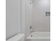 Clean bathroom showcasing a bright white tiled shower and a convenient built-in storage niche at 1886 Mays Crossroad Rd, Louisburg, NC 27549