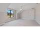 Cozy bedroom with plush carpet, a ceiling fan, and a large window offering scenic outdoor views at 1886 Mays Crossroad Rd, Louisburg, NC 27549