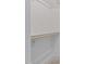 Walk-in closet with ample space and wooden rods for organized storage at 1886 Mays Crossroad Rd, Louisburg, NC 27549