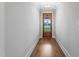 Inviting entryway features gleaming hardwood floors and views of the professionally landscaped yard at 1886 Mays Crossroad Rd, Louisburg, NC 27549