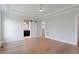Spacious bedroom boasting wood floors, ensuite bathroom, and a large closet at 1886 Mays Crossroad Rd, Louisburg, NC 27549