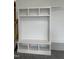 A built-in storage and shelving unit in the garage with epoxy flooring at 1886 Mays Crossroad Rd, Louisburg, NC 27549
