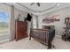 Bedroom featuring a trey ceiling and a dark wood bed set at 2011 Gibsonville Ossipee Rd, Elon, NC 27244