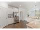 Bright kitchen featuring white cabinets, stainless steel appliances, and granite countertops at 2013 Magnolia Tree Ln, Durham, NC 27703