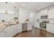 Bright kitchen featuring stainless steel appliances, granite countertops, and ample cabinet space at 2013 Magnolia Tree Ln, Durham, NC 27703