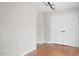 Bright bedroom featuring hardwood floors and a large closet with paneled doors at 206 Rocky Hills Rd, Pittsboro, NC 27312