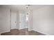 Bedroom featuring wood floors and access to a bathroom and closet at 206 Rocky Hills Rd, Pittsboro, NC 27312