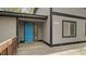Cozy front porch with blue door on a well-maintained home at 206 Rocky Hills Rd, Pittsboro, NC 27312