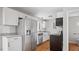 Kitchen with stainless steel appliances and a white tiled backsplash at 206 Rocky Hills Rd, Pittsboro, NC 27312