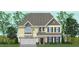 Inviting two-story home featuring a covered porch, attached garage, and professionally landscaped yard at 229 Savannah Moss Way # 121, Raleigh, NC 27603